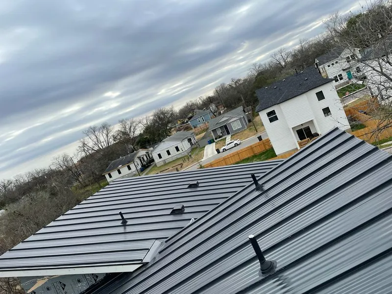 Standing seam metal roof panels with vents for Skylight Repair in Rockford